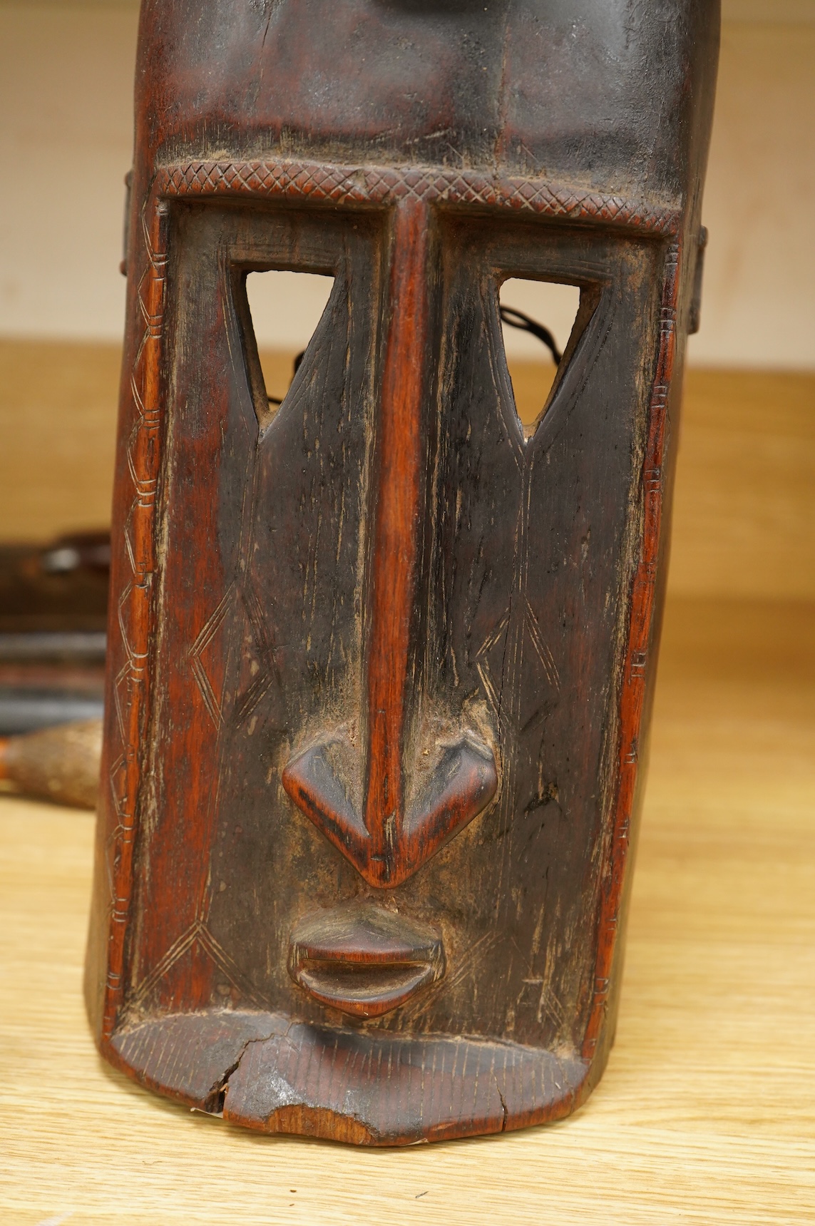 An African carved wood tribal Dogon mask, 49cm high